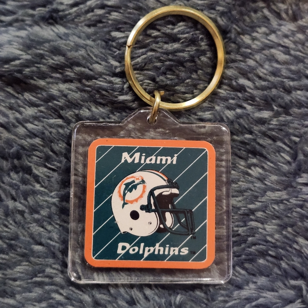 vintage Miami Dolphins acrylic keychain likely dates back to the 1970s or 1980